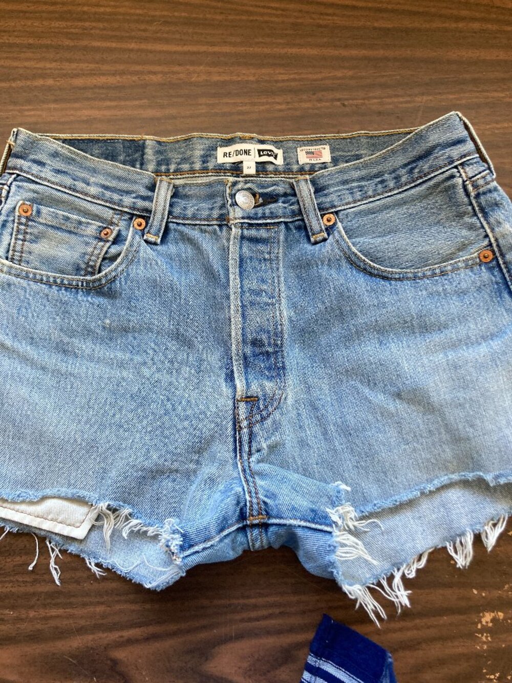 RE/DONE x Levi's reconstructed light wash denim cut off shorts
